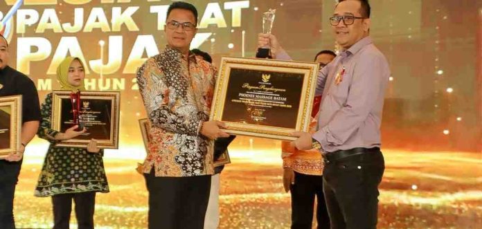 Wakil Ketua I DPRD Kota Batam dari Fraksi Partai Gerindra, Haji Aweng Kurniawan, menghadiri undangan Wali Kota Batam dalam kegiatan Apresiasi Wajib Pajak Taat Pajak Daerah Kota Batam Tahun 2026. Foto : ist